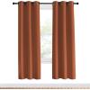 imageNICETOWN Halloween Blackout Curtain Panels for Girls Room Burnt Orange 1 Pair 34 x 70 inches Nursery Essential Thermal Insulated Solid Grommet Top Blackout Drapes