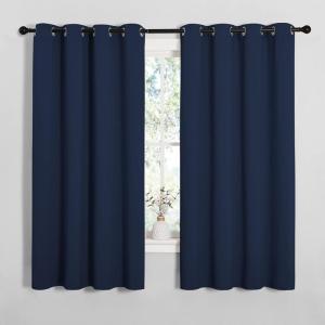 imageNICETOWN Blackout Draperies Curtains All Season Thermal Insulated Solid Grommet Top Blackout CurtainsDrapes for Kids Room Navy 1 Pair 55 x 68 inches