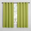 imageNICETOWN Blackout Curtain Panels for Loft Window Thermal Insulated Solid Grommet Top Blackout DraperiesDrapes for Window 1 Pair 55 x 68 inches in Fresh Green