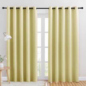 imageNICETOWN Blackout Draperies Curtains for Kids Room Paler Yellow Set of 2 70 by 84 inches Window Treatment Thermal Insulated Solid Grommet Blackout Drape Panels for Bedroom