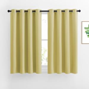 imageNICETOWN Room Darkening Curtains for Girls Room  Thermal Insulated Solid Grommet Room Darkening PanelsDrapes for Girls Bedroom Paler Yellow 1 Pair 52 by 54Inch