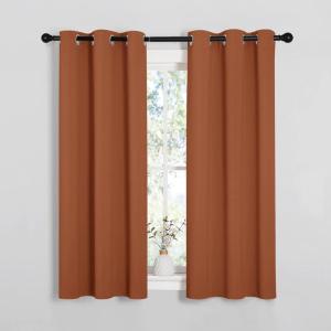 imageNICETOWN Blackout Halloween Draperies Curtains for Girls Room Nursery Essential Thermal Insulated Grommet Top Blackout Panels Burnt Orange 1 Pair 34 x 54 inches