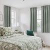 imageNICETOWN 100 Blackout Natural Curtains for Bedroom Rod Pocket Thermal Curtains Sound Reducing Window Treatments EasyMatching for Living Room W42 x L72 2 PanelsSage Green